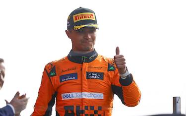 CIRCUIT ZANDVOORT, NETHERLANDS - AUGUST 25: Lando Norris, McLaren F1 Team, 1st position, celebrates on the podium during the Dutch GP at Circuit Zandvoort on Sunday August 25, 2024 in North Holland, Netherlands. (Photo by Andy Hone / LAT Images)