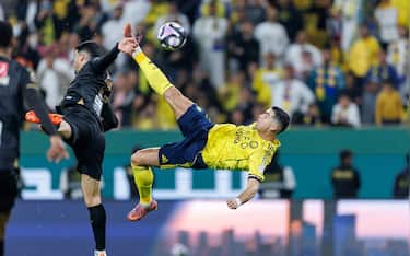 RIYADH, SAUDI ARABIA - NOVEMBER 23: Cristiano Ronaldo of team Al-Nassr FC scores their fourth goal during the Saudi Pro League match between Al Nassr and Al Khaleej at Al Awwal Park on November 23, 2025 in Riyadh, Saudi Arabia. (Photo by Abdullah Ahmed/Getty Images)