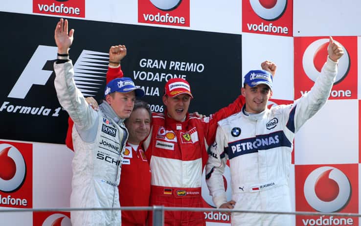 2006 Italian Grand Prix - Sunday Race, Monza, Italy.
Kimi Raikkonen, McLaren MP4/21-Mercedes-Benz, 2nd position, Jean Todt, Michael Schumacher, Ferrari 248F1, 1st position, and Robert Kubica, Sauber F1.06-BMW, 3rd position, podium.
10th September 2006 
World Copyright: Steve Etherington/LAT Photographic 
ref: 48mb Hi Res Digital Image Only