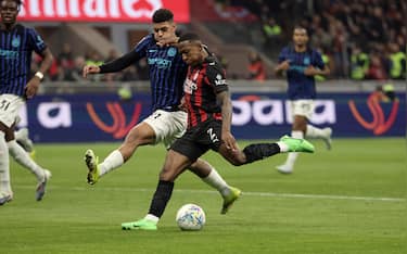 Ac Milan's Pervis Estupiñán (R) scores against Inter Milan’s Luis Henrique goal of 1 to 0 during the Italian serie A soccer match between Milan and Inter at Giuseppe Meazza stadium in Milan, 8 March  2026.ANSA / MATTEO BAZZI
