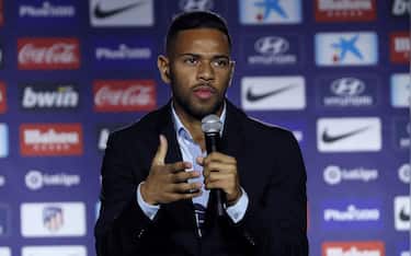 epa07705178 Brazilian winger Renan Lodi attends a press conference during his presentation as new Atletico Madrid's player at Wanda Metropolitano Stadium in Madrid, Spain, 09 July 2019.  EPA/J.J. Guillen