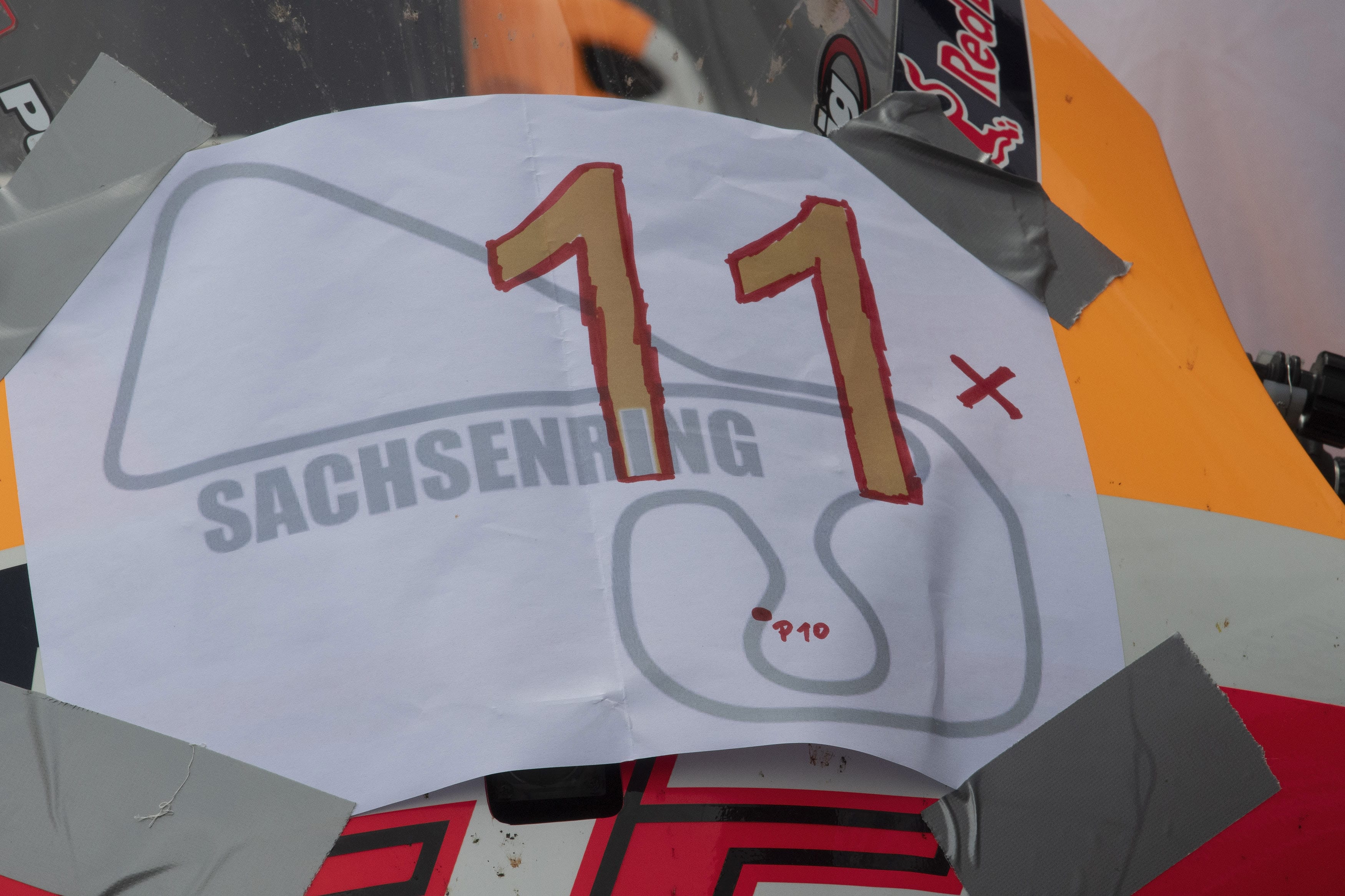 HOHENSTEIN-ERNSTTHAL, GERMANY - JUNE 20:  The bike of  Marc Marquez of Spain and Repsol Honda Team celebrates the victory (eleven consecutive wins in this circuit)  during the MotoGP race during the MotoGP of Germany - Race at Sachsenring Circuit on June 20, 2021 in Hohenstein-Ernstthal, Germany. (Photo by Mirco Lazzari gp/Getty Images)