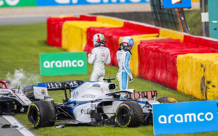 SPA-FRANCORCHAMPS, BELGIUM - AUGUST 30: George Russell, Williams FW43 and Antonio Giovinazzi, Alfa Romeo Racing C39, both start to exit their cars after a collision on track during the Belgian GP at Spa-Francorchamps on Sunday August 30, 2020 in Spa, Belgium. (Photo by Zak Mauger / LAT Images)