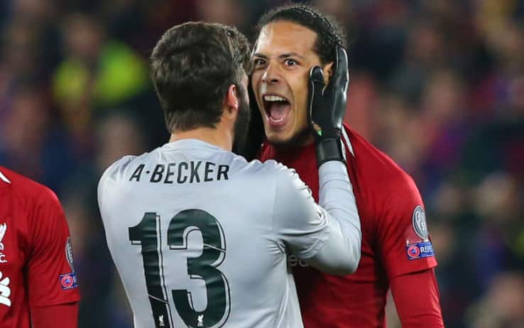 Alisson e Van Dijk esultano dopo la conquista della finale di Champions