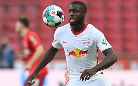 epa09147635 Leipzig's Dayot Upamecano in action during the German Bundesliga soccer match between FC Koeln and RB Leipzig in Cologne, Germany, 20 April 2021.  EPA/SASCHA STEINBACH / POOL CONDITIONS - ATTENTION: The DFL regulations prohibit any use of photographs as image sequences and/or quasi-video.