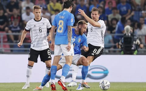 Italy's  Davide Frattesi    and Germany's Leon Goretzka   in action during the Uefa Nations League,group A3,soccer match Italy vs Germany at Renato Dall'Ara stadium in Bologna, Italy, 04 June 2022. ANSA /SERENA CAMPANINI