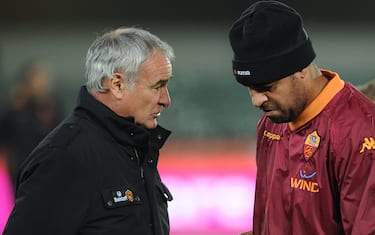 AS Roma coach Claudio Ranieri (L) talks with his player AS Roma Brazilian forward Adriano as he warms up prior the Italian serie A football match Chievo vs AS Roma on December 4, 2010 at Marc'Antonio Bentegodi stadium in Verona. AFP PHOTO / ALBERTO PIZZOLI (Photo credit should read ALBERTO PIZZOLI/AFP/Getty Images)