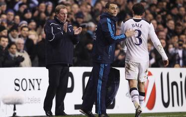 LONDON, ENGLAND - NOVEMBER 24:  Harry Redknapp, manager of Tottenham Hotspur applauds  Gareth Bale of Tottenham Hotspur as he is substituted during the UEFA Champions League Group A match between Tottenham Hotspur and SV Werder Bremen at White Hart Lane on November 24, 2010 in London, England.  (Photo by Scott Heavey/Bongarts/Getty Images) *** Local Caption *** Harry Redknapp;Gareth Bale