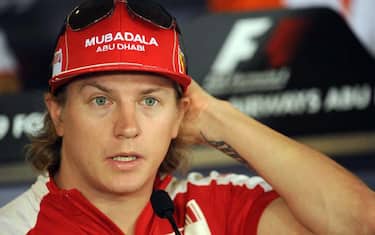 epa01914134 Finnish Formula One driver Kimi Raikkonen of Ferrari listens to questions during a press conference at the newly built Yas Marina Circuit in Abu Dhabi, United Arab Emirates, 29 October 2009. The Abu Dhabi Grand Prix will be held on 01 November 2009.  EPA/PETER STEFFEN