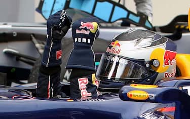 epa02103603 German Formula One driver Sebastian Vettel of Red Bull Racing celebrates his victory in 2010 Formula One Grand Prix of Malaysia at the Sepang International circuit, outside Kuala Lumpur, Malaysia, 04 April 2010. Sebastian Vettel finished first, followed by Australian Formula One driver Mark Webber of Red Bull Racing in second place and German Formula One driver Nico Rosberg of Mercedes GP in third.  EPA/SRDJAN SUKI