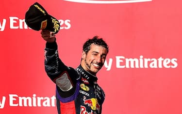 AUSTIN, TX - NOVEMBER 02:  Daniel Ricciardo of Australia and Infiniti Red Bull Racing celebrates on the podium after the United States Formula One Grand Prix at Circuit of The Americas on November 2, 2014 in Austin, United States.  (Photo by Mark Thompson/Getty Images)