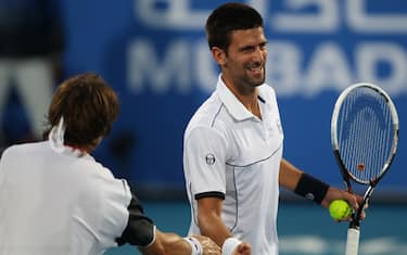 sport_tennis_djokovic_ferrer_finale_esibizione_abu_dhabi_2011_getty