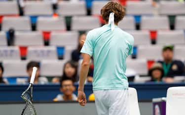SHANGHAI, CHINA - OCTOBER 13:  Alexander Zverev of Germany reacts by crashing his racquet the match against Jo-Wilfried Tsonga of France in the Men's singles third round match on day five of Shanghai Rolex Masters at Qi Zhong Tennis Centre on October 13, 2016 in Shanghai, China.  (Photo by Lintao Zhang/Getty Images)