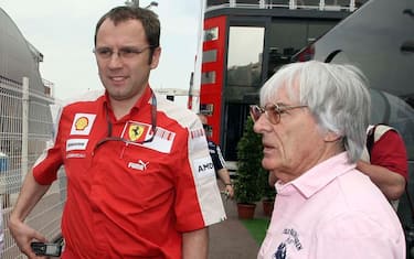 Bernie Ecclestone, president and CEO of the Formula One management , right, and Ferrari team principal Stefano Domenicali arrive to attend a FOTA (Formula One Teams Association) meeting at the  Monaco racetrack, Friday May 22, 2009. (AP Photo/David Vincent)