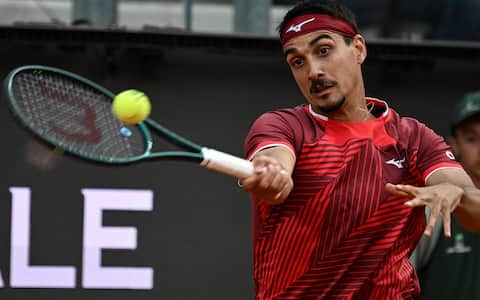 Lorenzo Sonego of Italy in action during his man's singles match against Ignacio Buse of Peru (not pictured) at the Italian Open tennis tournament in Rome, Italy, 7 May 2026. ANSA/RICCARDO ANTIMIANI
