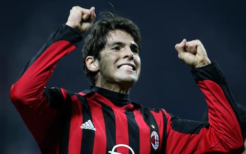 Milan, ITALY:  AC Milan's midfielder Kaka celebrates after scoring a goal against Bayern Munich during their Champions League football match AC Milan-Bayern Munich at San Siro stadium in Milan,08 March 2006.  AFP PHOTO / PACO SERINELLI  (Photo credit should read PACO SERINELLI/AFP via Getty Images)