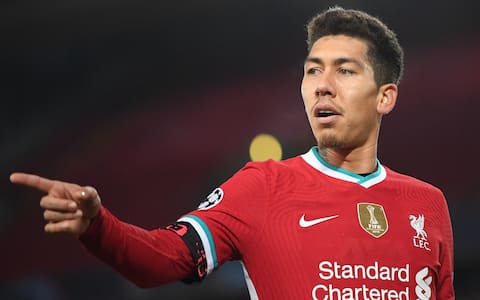 epa08856076 Liverpool's Roberto Firmino reacts during the UEFA Champions League group D soccer match between Liverpool FC and Ajax Amsterdam in Liverpool, Britain, 01 December 2020.  EPA/Michael Regan / POOL