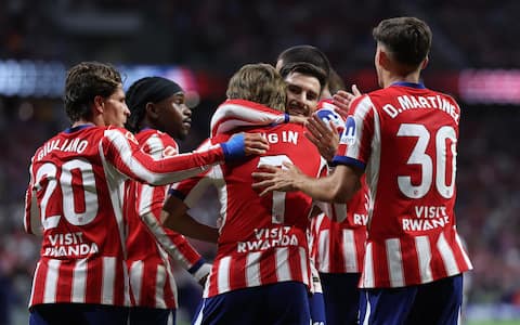 epa13179604 Atletico's Kang-In Lee (C) celebrates with his teammates after scoring the 1-0 goal during the Spanish LaLiga soccer match between Atletico de Madrid and Malaga CF in Madrid, Spain, 19 August 2026.  EPA/KIKO HUESCA