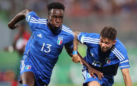 epaselect epa10750477 Michael Kayode (L) of Italy celebrates scoring the opening goal during the 2023 UEFA European Under-19 Championship final soccer match between Portugal and Italy at the National Stadium in Taâ€™ Qali, Malta, 16 July 2023.  EPA/Domenic Aquilina