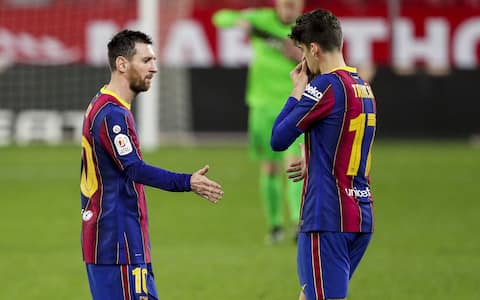 SEVILLA, SPAIN - FEBRUARY 10: (L-R) Lionel Messi of FC Barcelona, Trincao of FC Barcelona during the Spanish Copa del Rey  match between Sevilla v FC Barcelona at the Estadio Ramon Sanchez Pizjuan on February 10, 2021 in Sevilla Spain (Photo by David S. Bustamante/Soccrates/Getty Images)