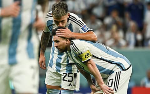Lionel Messi of Argentina and Lisandro Martinez of Argentina during Netherlands v Argentina match of the Fifa World Cup Qatar 2022 at Lusail Stadium in Doha, Qatar on December 9, 2022. Photo by Laurent Zabulon/ABACAPRESS.COM