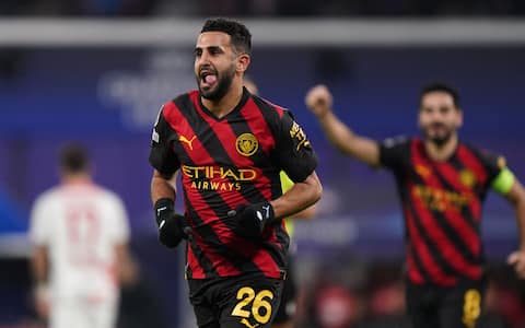 Manchester City's Riyad Mahrez celebrates scoring their side's first goal of the game during the Champions League round of 16 first leg match at the Red Bull Arena in Leipzig, Germany. Picture date: Wednesday February 22, 2023.