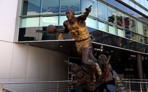 LOS ANGELES - SEPTEMBER 11:  Omri Amrany and Gary Tillery's statue of former Los Angeles Lakers basketball player Ervin 'Magic' Johnson stands in Star Plaza at Staples Center, home of the Los Angeles Lakers, Los Angeles Clippers and Los Angeles Sparks basketball teams and Los Angeles Kings hockey team in Los Angeles, California on September 11, 2017.  MANDATORY MENTION OF THE ARTIST UPON PUBLICATION - RESTRICTED TO EDITORIAL USE.  (Photo By Raymond Boyd/Getty Images)
